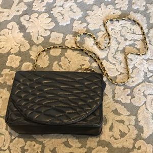 Black bag with gold chain